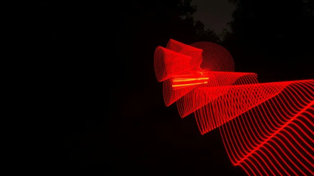 Rote Lichtspur in der Dunkelheit – BDSM-Begriffe erklärt